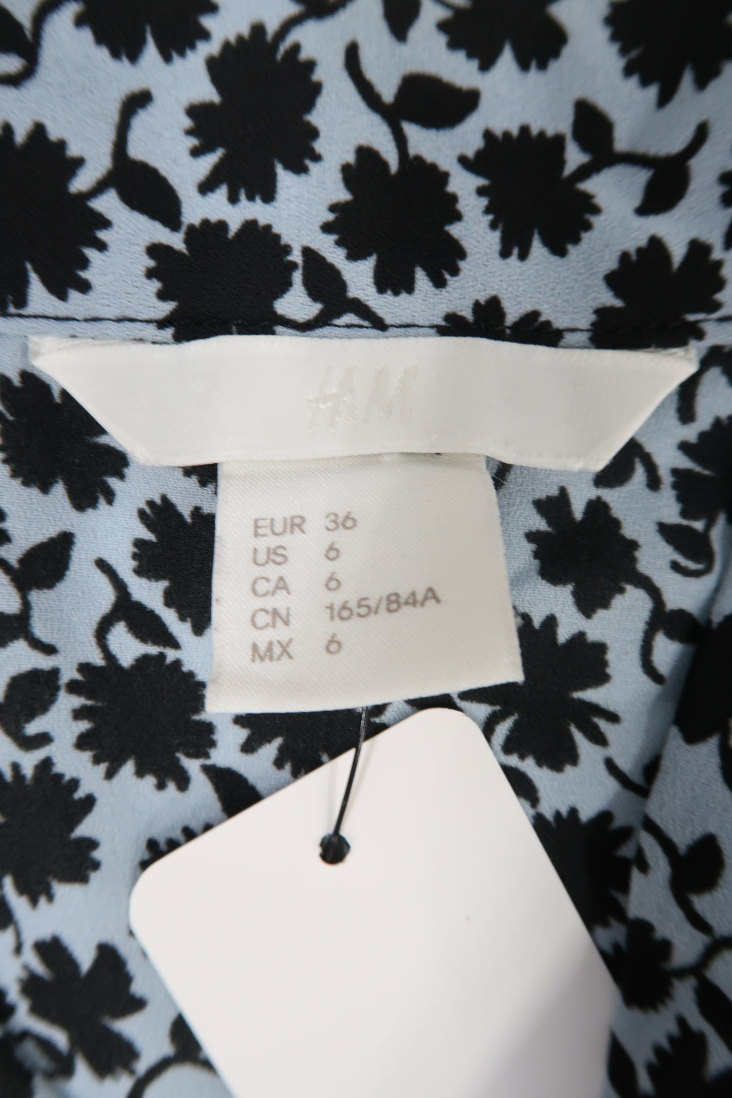 Chemisier bleu ciel à fleurs noires - H&M - S