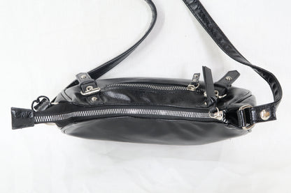 Sac à main en cuir noir avec clous argentés - Parfois